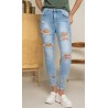 Jean skinny stretch avec têtes de mort